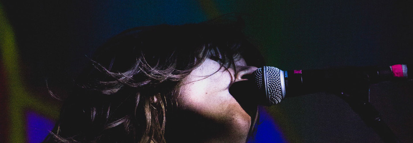 indie-rock-concert-woman-singing.jpg